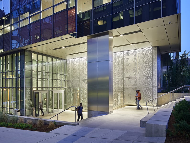 Main entrance to Troy Block with people coming and going
