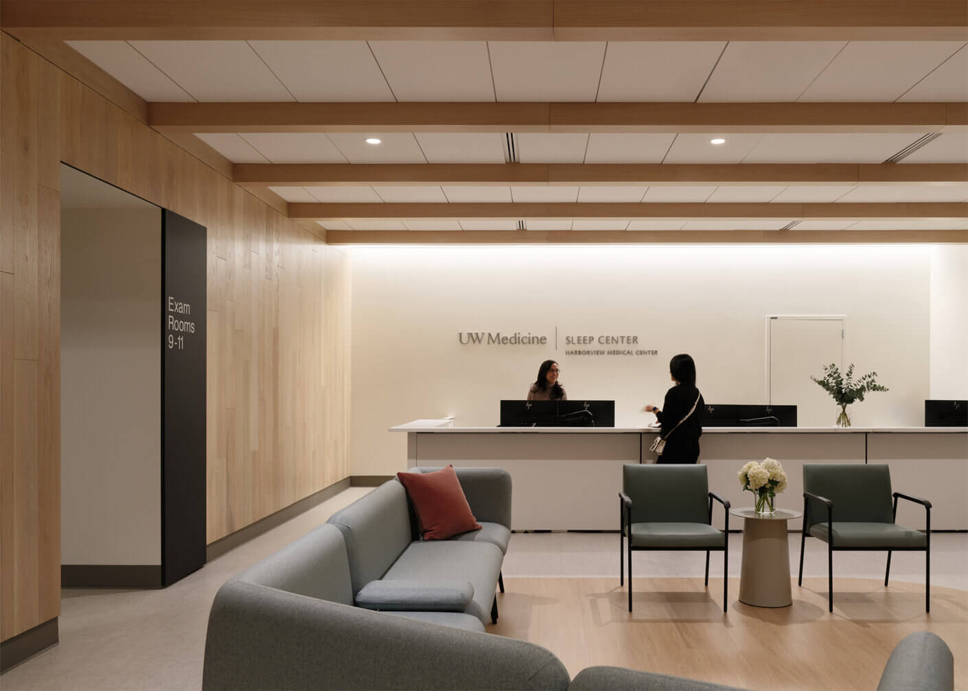 Modern sleep center reception area with seating and staff interaction.