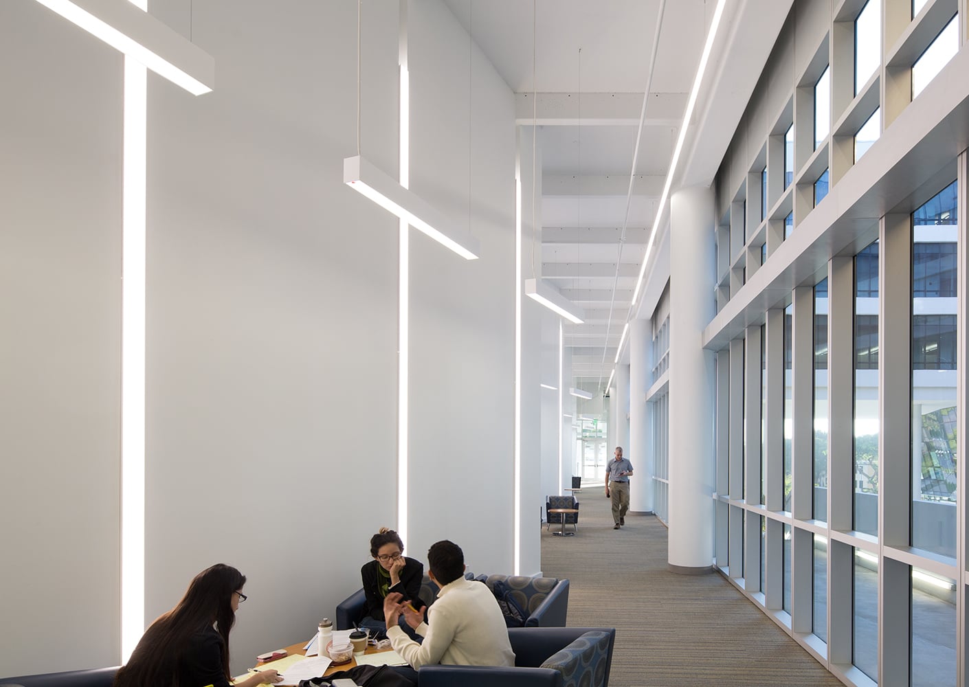 Zig-zag wall detailing in the hallways creates break-out spaces for student collaboration