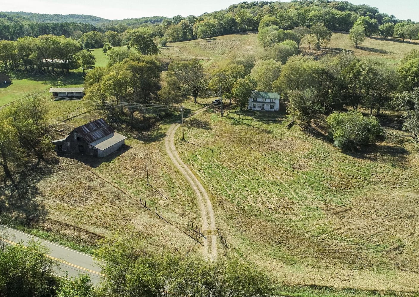Rolling hills, pastureland, woodland and farmhouses dot the landscape