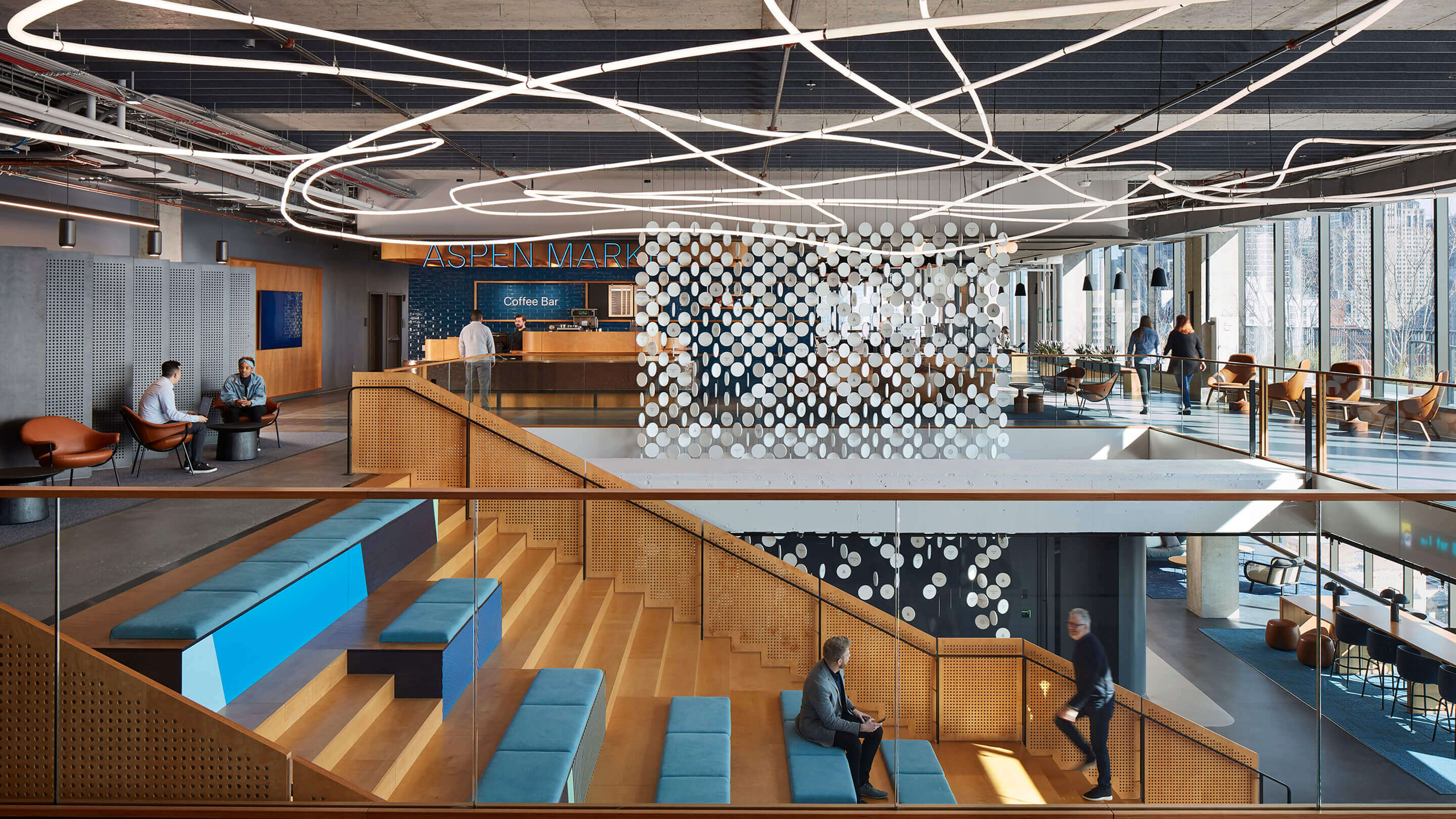 Photo showing new office design, with wide staircase seating