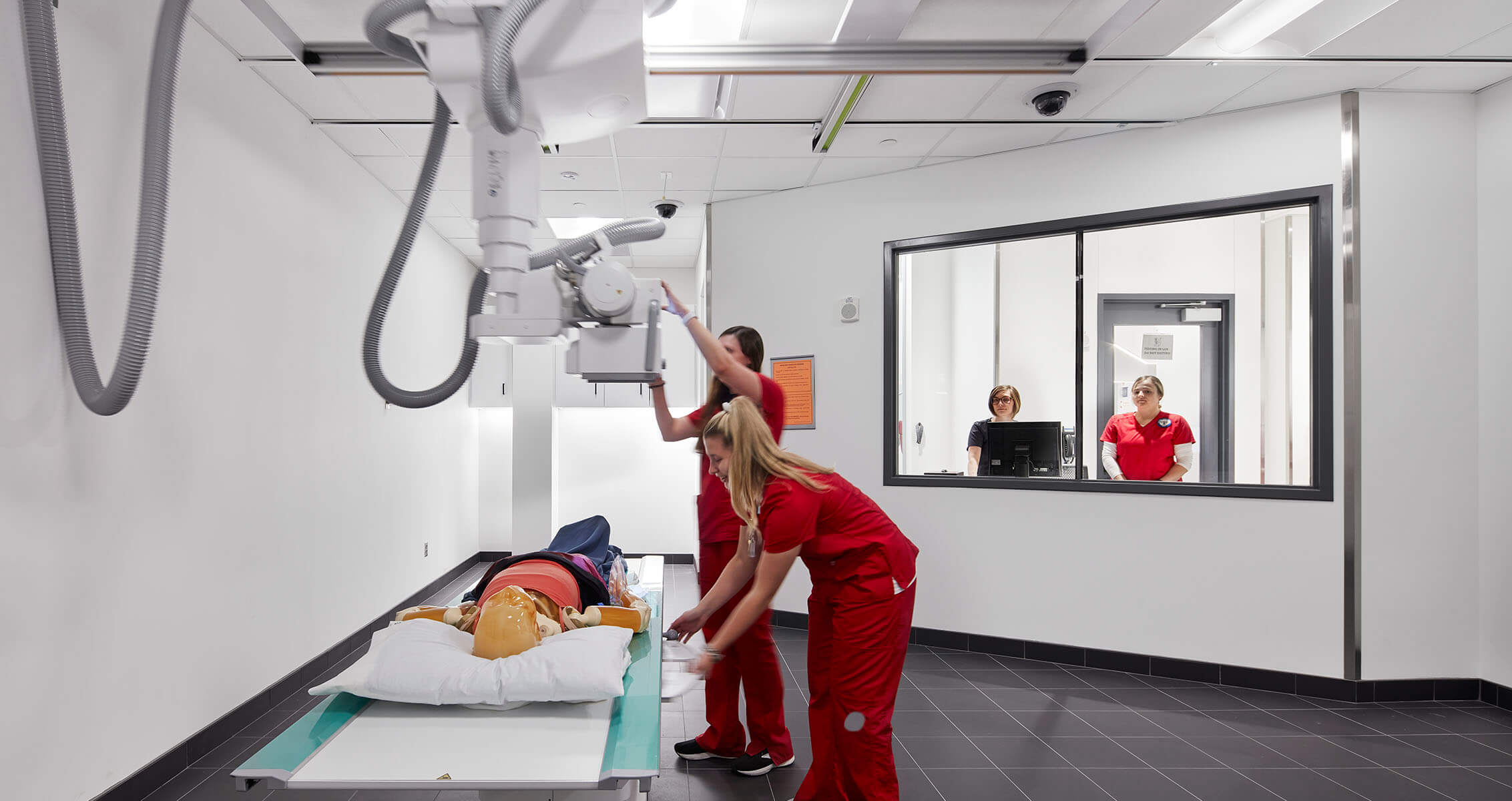Photo of medical imaging students in a radiography lab