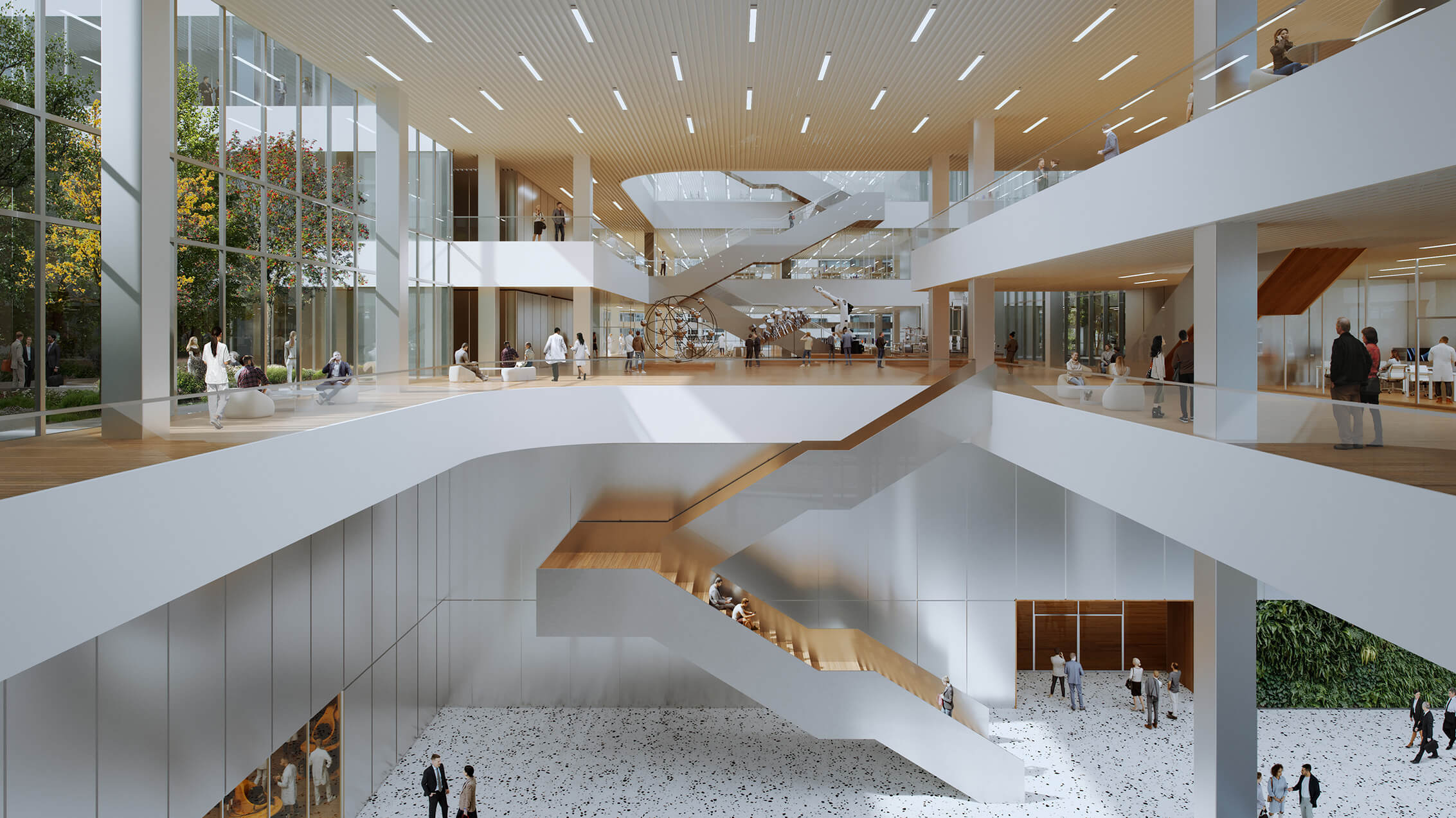 An Open staircase continues along the side of the central atrium to link the exhibition and auditorium at L1 with the atrium, workspaces and library at the upper levels.