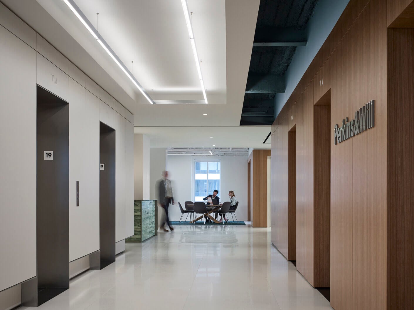 A lobby with elevators.