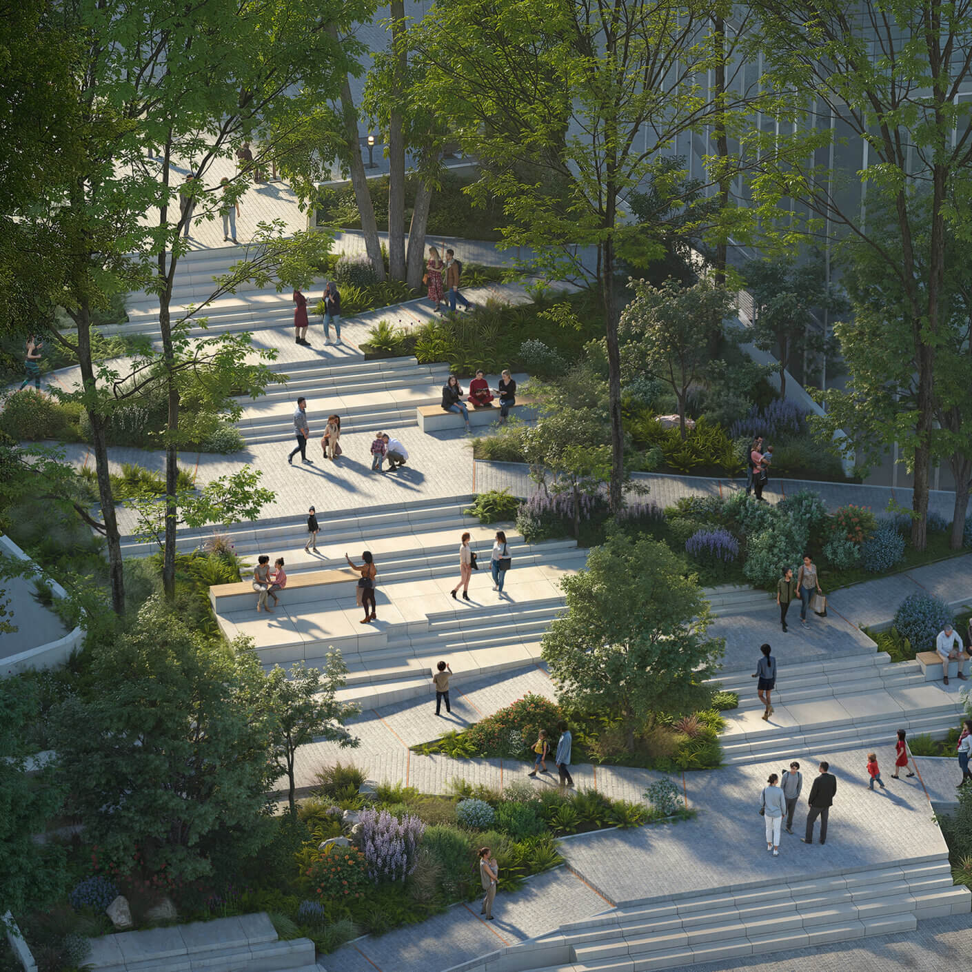 People enjoying a sunny day in a tiered urban park with greenery and trees.