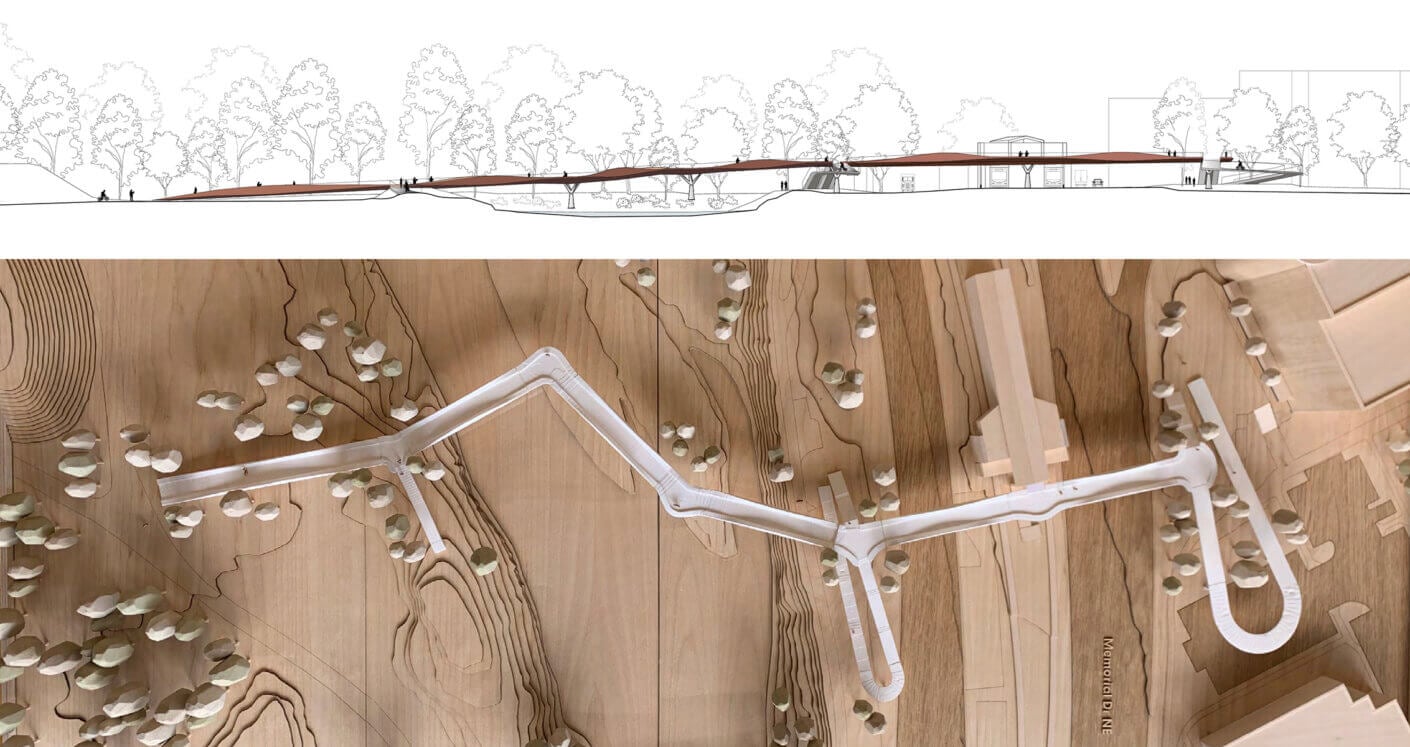 Architectural model with pathway and landscape elements.