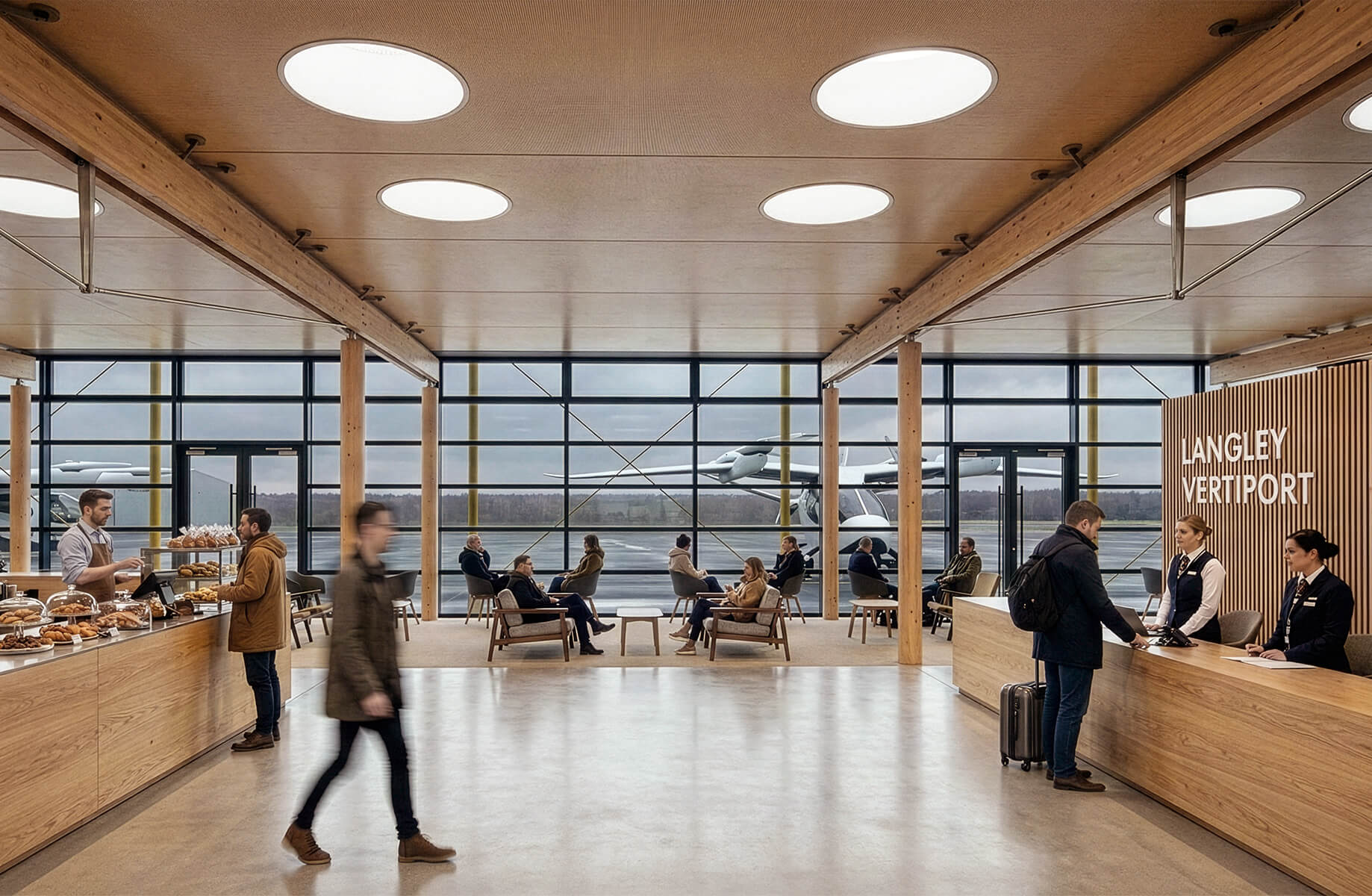 Interior view of Langley Vertiport, featuring a reception area, seating for passengers, and large windows overlooking aircraft and the runway.